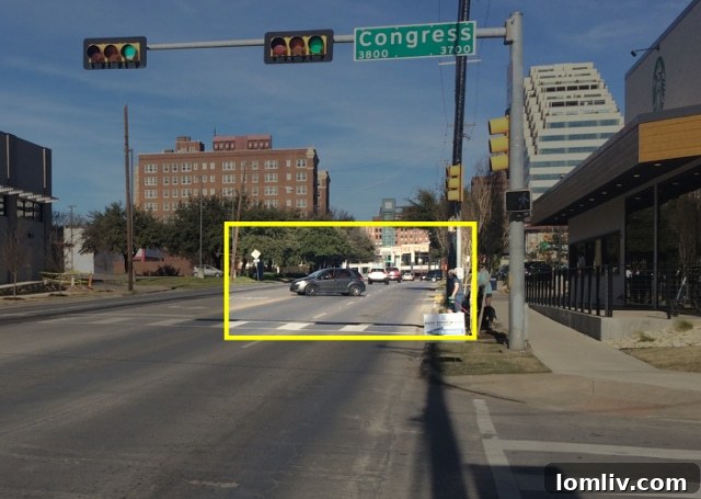 Vehicles making left turn from Starbucks Oak Lawn