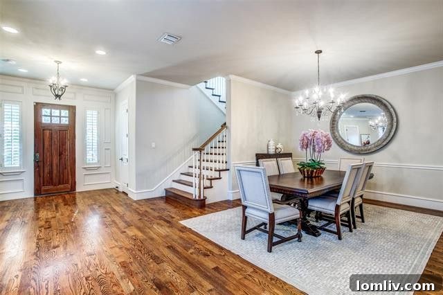 Expansive interior hardwood flooring in the main living area of the Dallas home