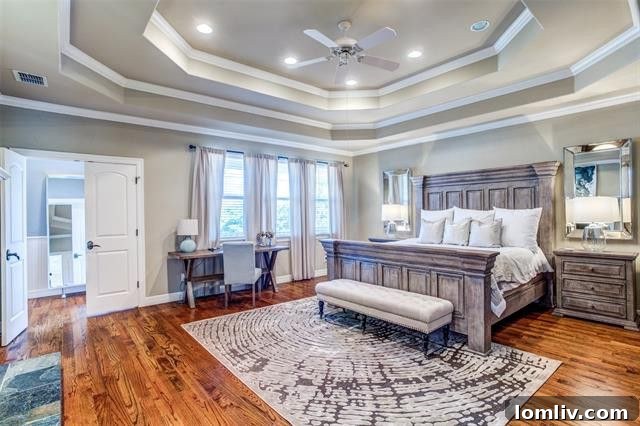 Luxurious master bathroom featuring a clawfoot tub and standalone shower at 5345 Goodwin Ave