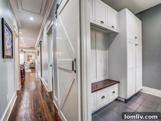 Exquisite North Oak Cliff Craftsman Seeks New Owner 7 Elegant Interior with French Doors and Exposed Brick Fireplace