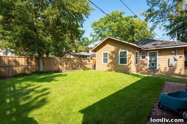 Exquisite North Oak Cliff Craftsman Seeks New Owner 8 Spacious Fenced Backyard with Paver Pathway and Storage Shed