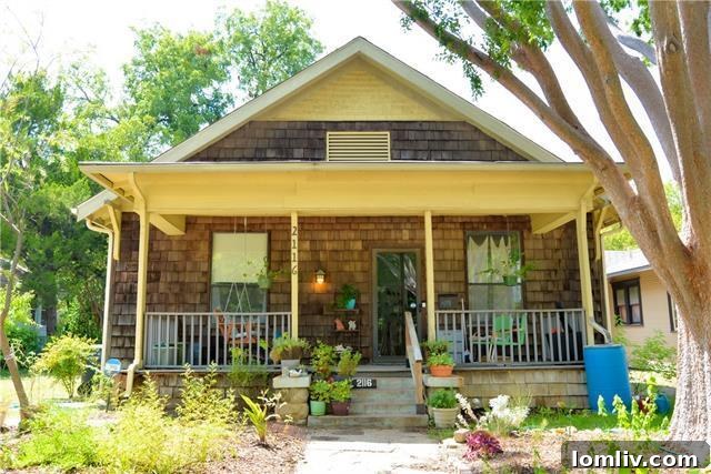 Front exterior of a charming Fairmount shingled cottage with xeriscape landscaping
