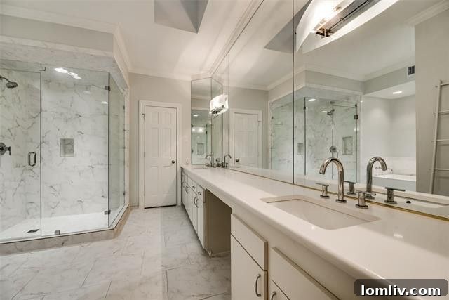 Luxurious master bathroom with freestanding tub in Dallas condo