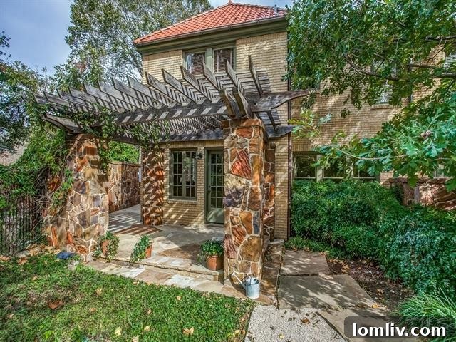 The charming carriage house with sliding barn doors at 1805 Mayflower