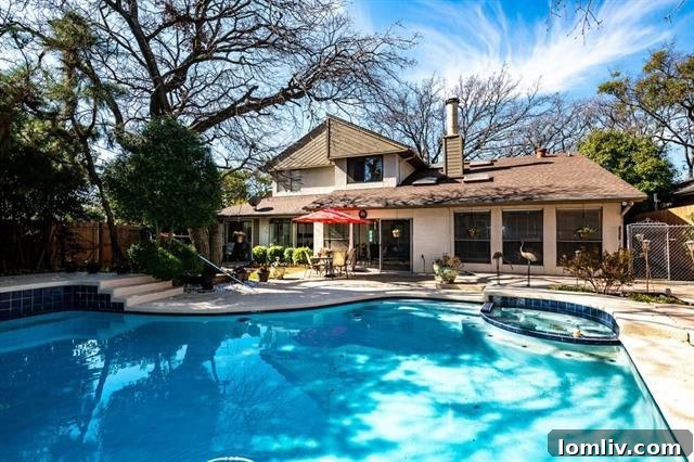 Outdoor pool and jacuzzi area in the contemporary home