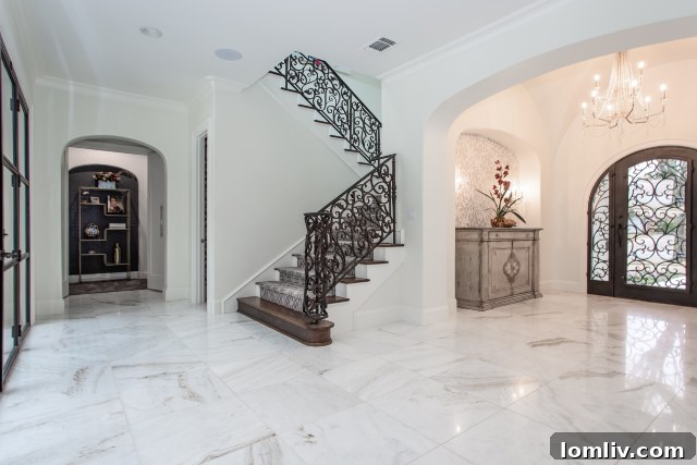 Grand Entryway of 4000 Monticello Drive after renovation - Open, Light, and Bright