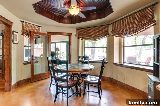 Modernized bathroom with distinctive tile and frameless shower