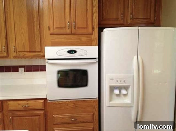 Modern kitchen with updated appliances at Silver Maple Court