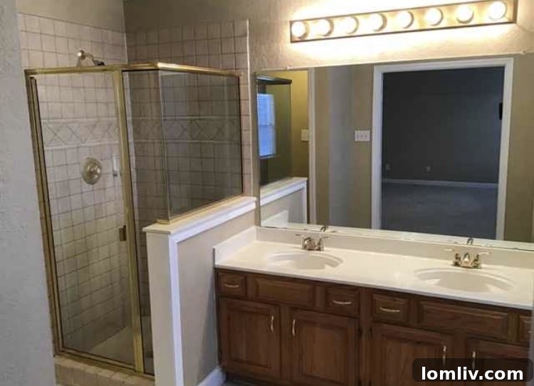 Elegant bathroom with double vanity and contemporary finishes