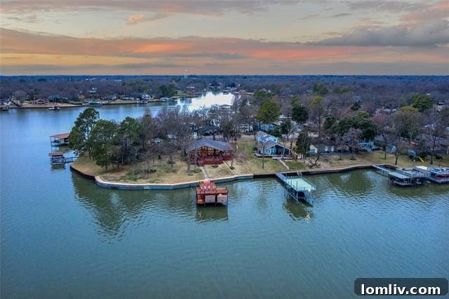 Experience unparalleled lakefront living at 1952 Cherokee Trace on Cedar Creek Lake