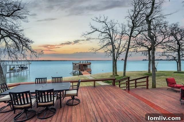 Luxurious boathouse with upper deck and covered slips on Cedar Creek Lake