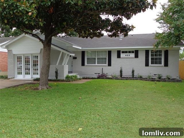 Charming exterior of a remodeled home in Richardson Heights, featuring a welcoming facade and mature landscaping.
