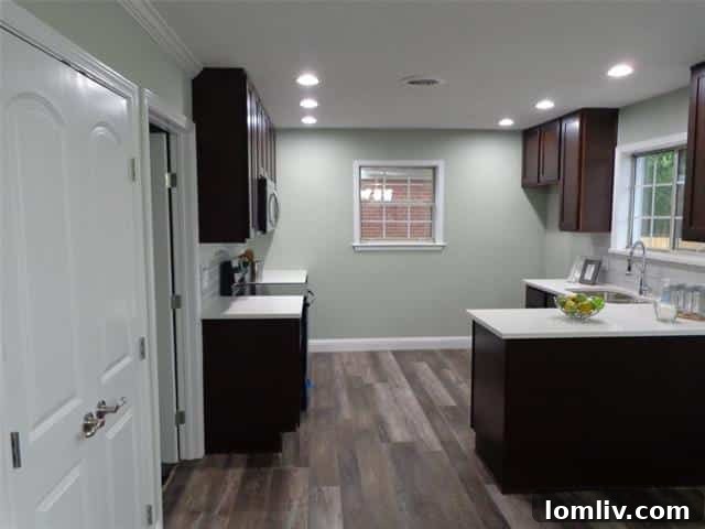 Spacious and serene bedroom with fresh paint and new flooring, offering a comfortable personal space.