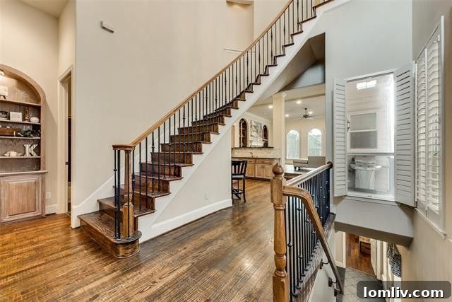 Cozy living room adorned with classic plantation shutters, offering comfort and style.
