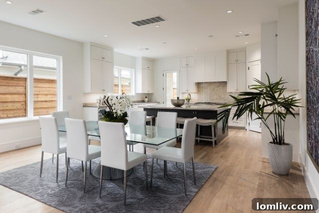 Elegant master bedroom in new Miller Avenue duplex with large windows