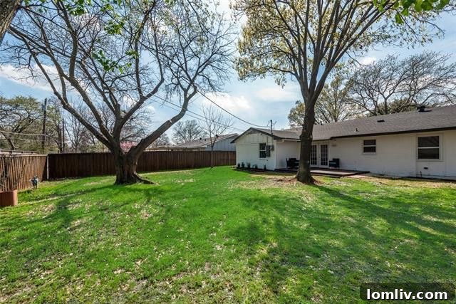 Updated bathroom with ceramic tile at 1402 N. Floyd Road