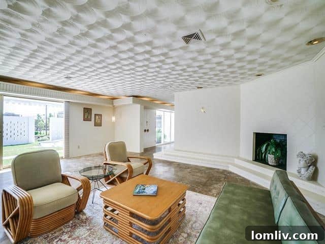 Living room with original ceiling details and hidden speakers
