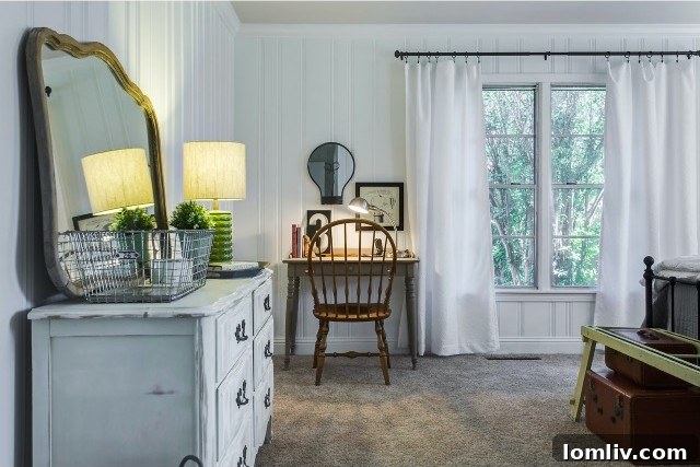 A tastefully decorated corner of a guest room transformed into a home office, complete with a desk, chair, and minimalist decor.