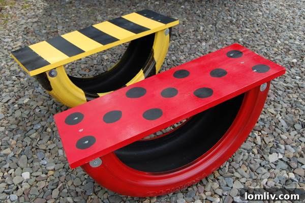 Backyard Builds for Endless Kid Fun 5 Repurposed old tire transformed into a colorful seesaw for kids