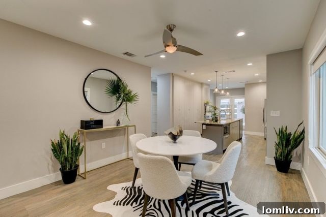 Bright and airy living room in the renovated Bluebonnet Hills home