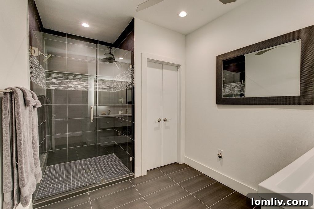 Master bathroom with double vanity and spacious walk-in shower