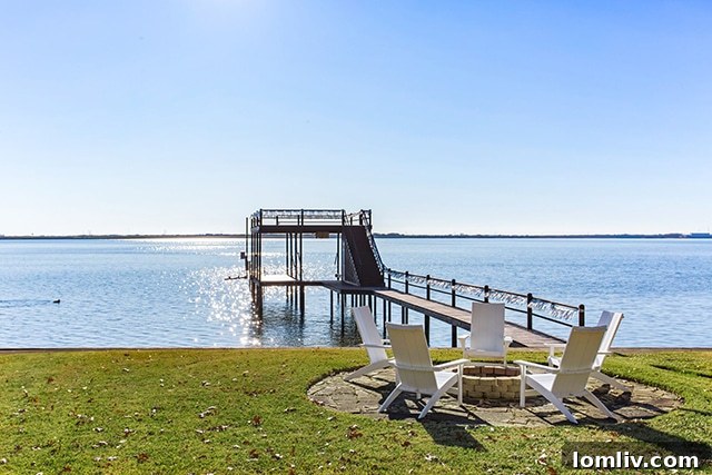 Located on the lake: a double-deck boat house with wave runner lift.