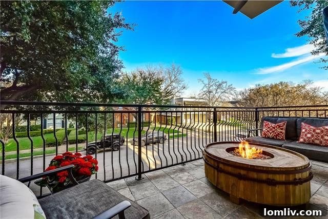 Serene fenced-in front lawn with a decorative fountain, designed for low-maintenance enjoyment