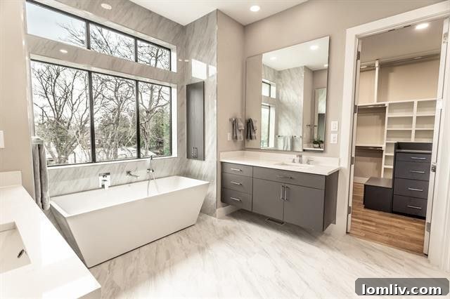 Elegant dining area with modern chandelier and ample natural light