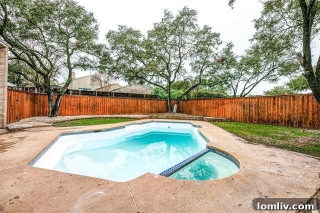 Elegant dual vanity in the master bathroom, featuring ample counter space.