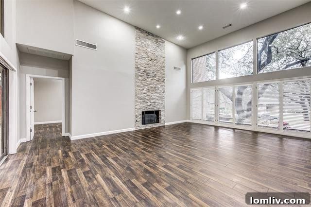 Side view of the elegant home, showcasing its unique design elements.