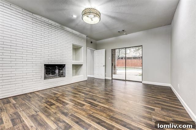 Luxurious master bathroom with a large walk-in shower and modern fixtures.
