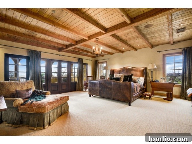 Spa-like master bathroom featuring a large soaking tub, separate glass shower, and dual vanities for ultimate relaxation