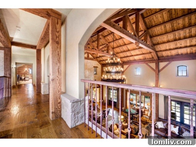 Spacious game room with billiards table, comfortable seating, and various entertainment options for all ages