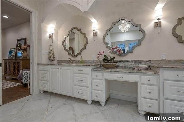 Sophisticated Master Bathroom with Dual Vanities and Freestanding Tub