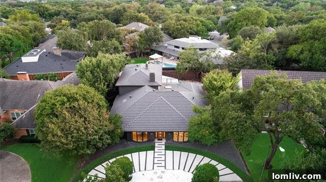 Stunning Lake Highlands home exterior with lush landscaping and a welcoming curb appeal, hinting at the vibrant real estate market