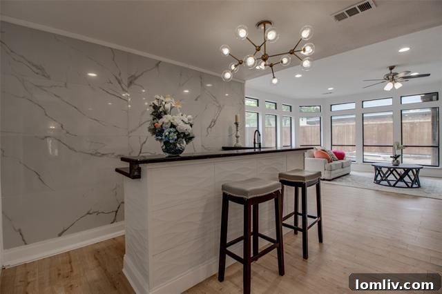Contemporary kitchen featuring quartz countertops and stainless steel appliances, designed for both functionality and aesthetic appeal