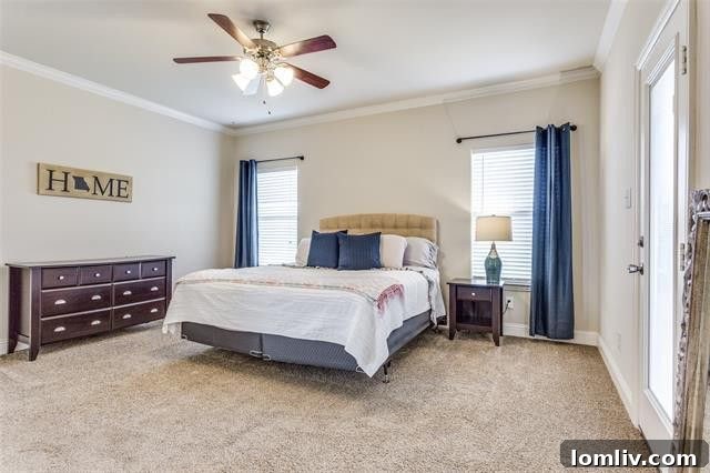 Classic traditional brick home with elegant stone accents in a rural setting