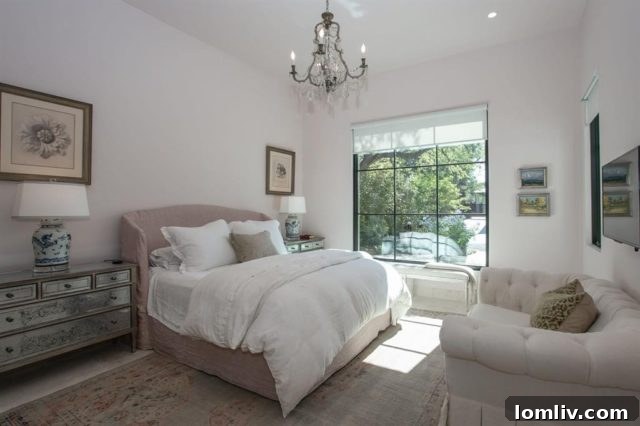 Lush master bedroom with custom furnishings and elegant decor