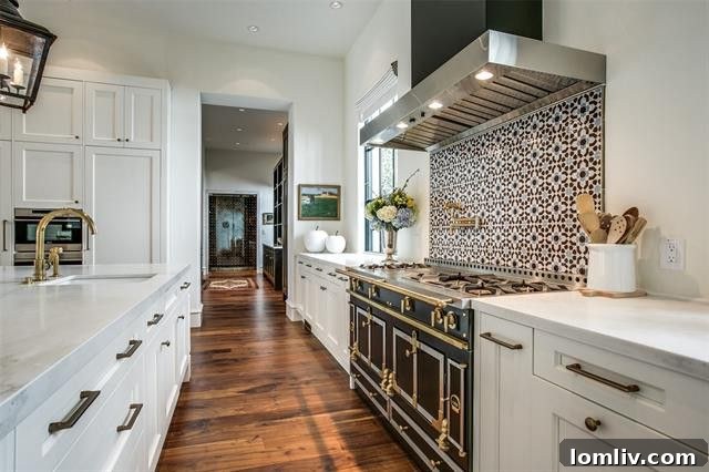 The state-of-the-art chef's kitchen featuring a La Cornue range and custom cabinetry