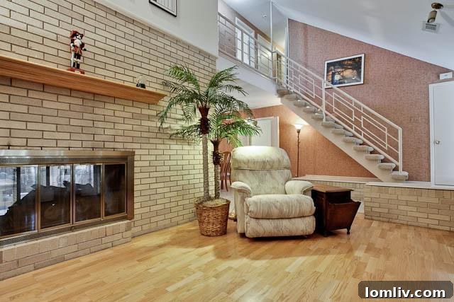 Exterior view of 2606 Beechmont Drive in 2012, showcasing its original mid-century modern facade and landscaping.