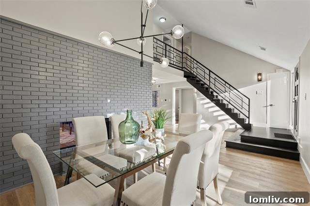 Contemporary exterior view of 2606 Beechmont Drive today, showcasing updated landscaping, modern curb appeal, and refreshed paint.