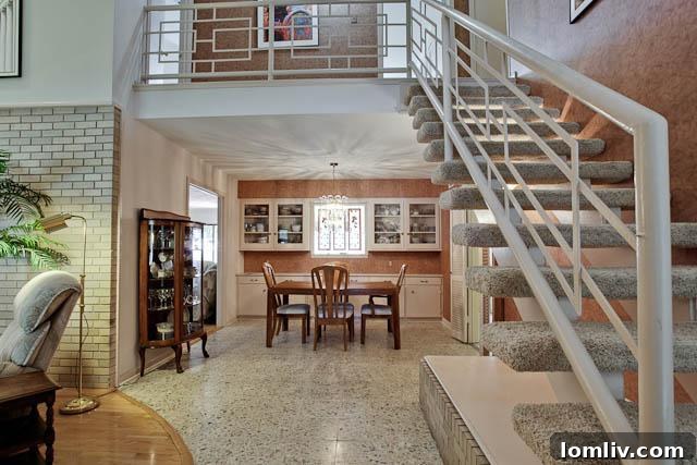 Interior view of 2606 Beechmont Drive in 2012, showing the original living space layout and kitchen area.