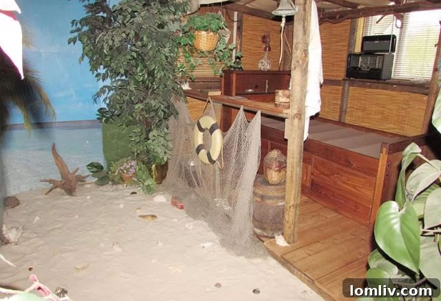 Close-up of quirky wall art and a themed bed