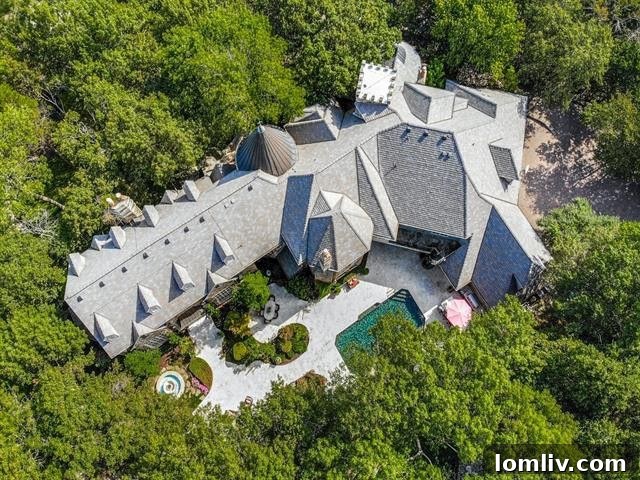 Panoramic view of the luxury home at 941 Circle in the Woods, showcasing its expansive grounds