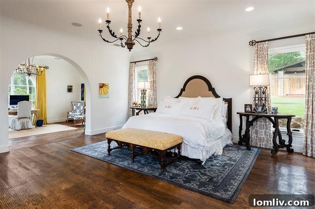 Expansive backyard with a manicured lawn and mature trees