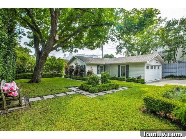 The impressive four-car climate-controlled garage with an attached workshop and powder bath
