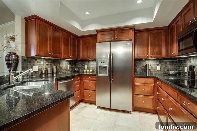 Elevate Your Lifestyle in University Park 4 Gourmet Kitchen with Bosch Appliances and Gleaming Granite Countertops