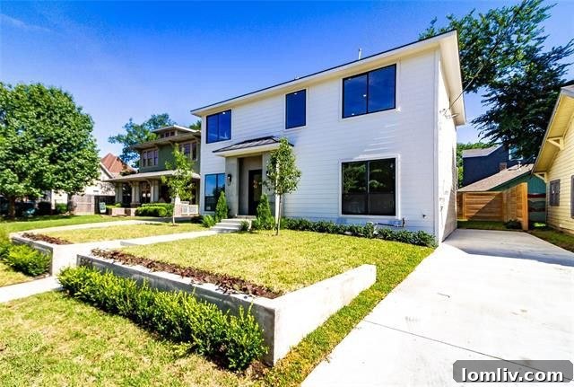 Exterior view of a stunning modern home in Vickery Place, East Dallas, with a sleek design