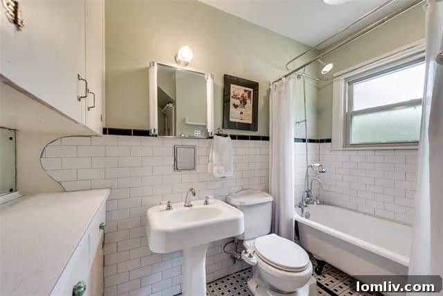 Charming Oakhurst bathroom with claw-foot tub