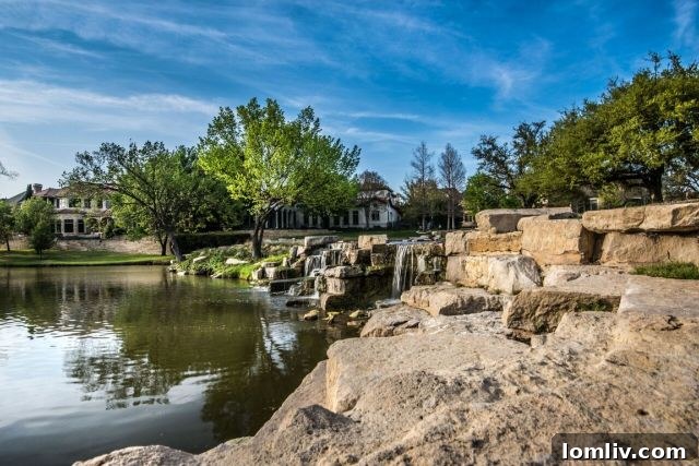 Stunning stone and iron entrance to Lake Forest, a luxury gated community in North Dallas
